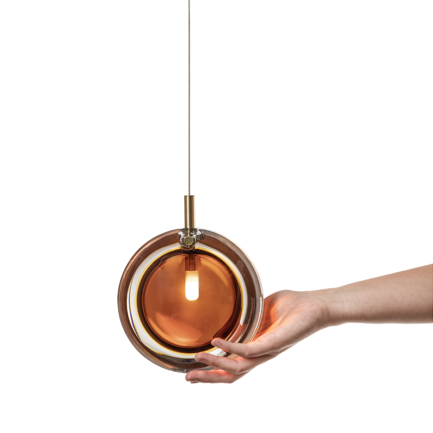 Lens-single-pendant-amber-front-hand